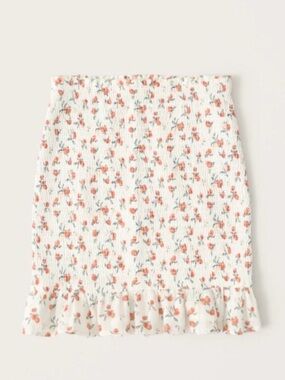 Floral Smocked Mini Skirt in White with Peach/ Orange Print